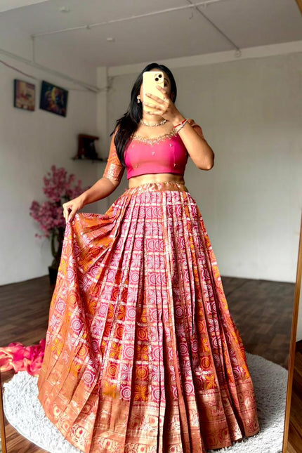 A gorgeous Peach Bandhej Half Saree SS934